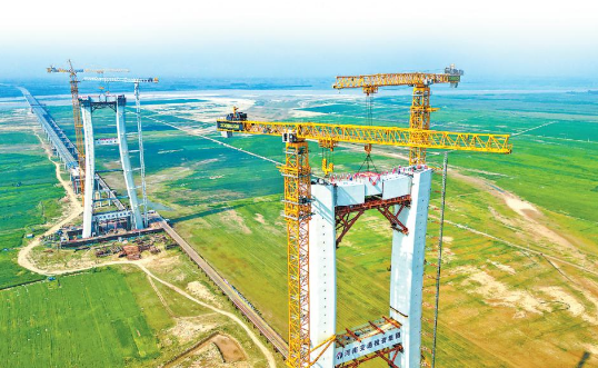 毅源钢构说说：182米全国首座无纵筋钢混组合塔在郑州封顶